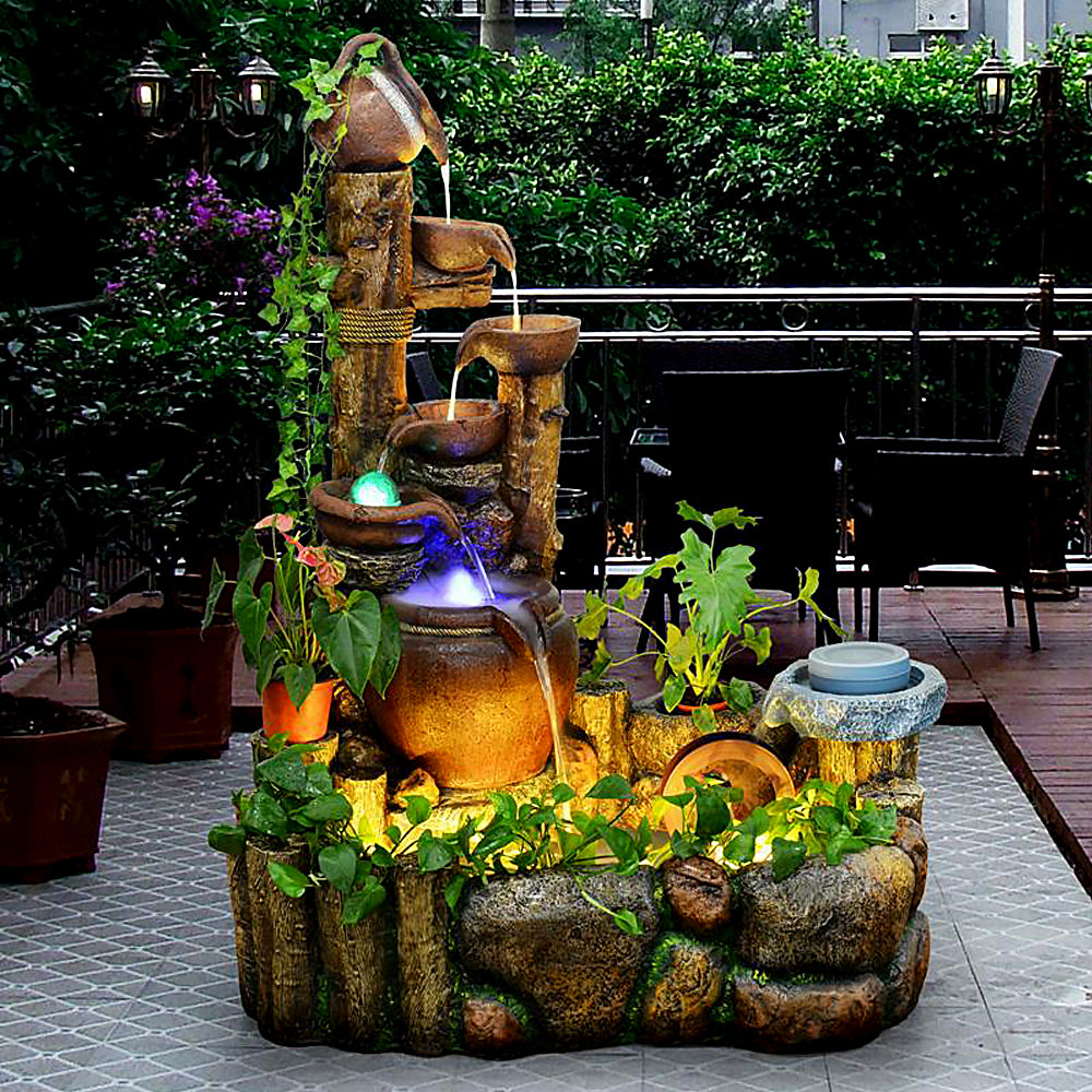 indoor water feature with plants Large Indoor Waterfall With Feng Shui Wheel
