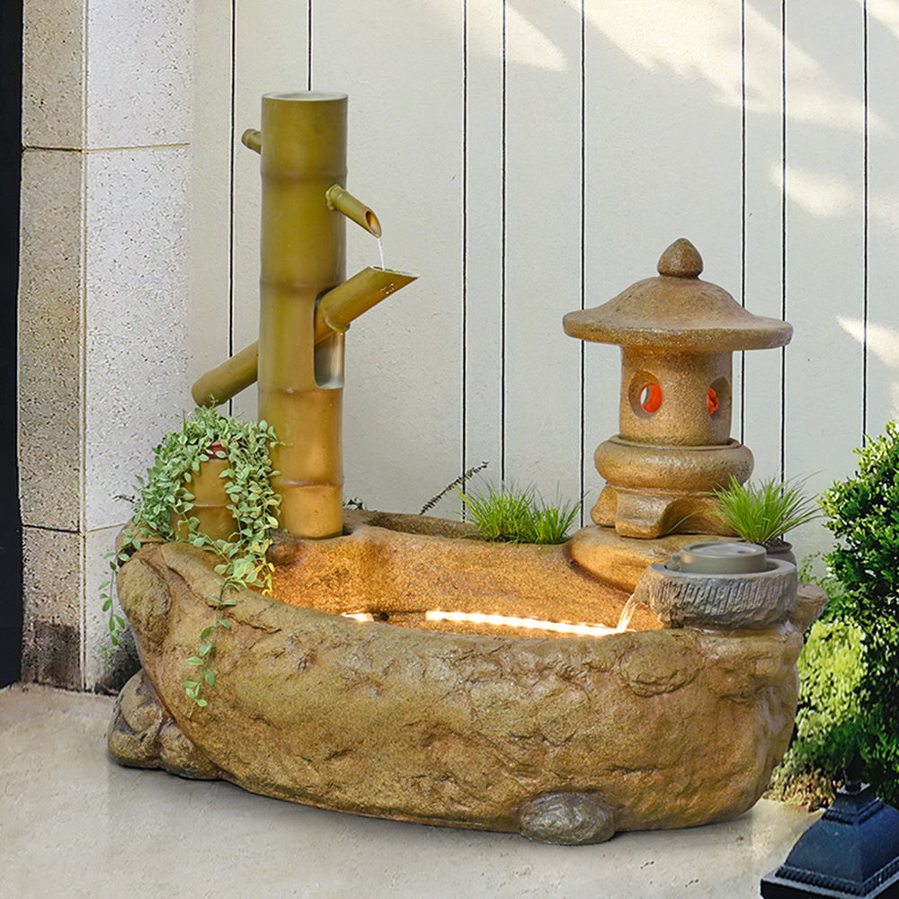 Japanese-Style Bamboo Fountain Waterfall With Idyllic Zen Flowing Water