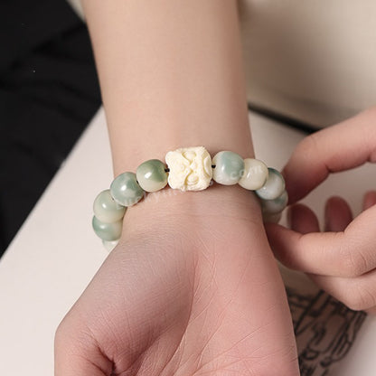 Ivory Nut Dancing Lion Bodhi Beads Bracelet