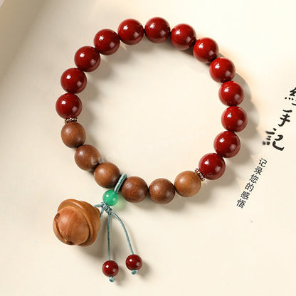 Purple Gold Cinnabar Sandalwood Beads Peach Wood Bell Bracelet